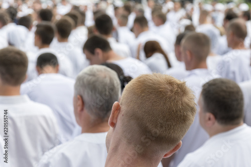 Meeting of people in white clothes