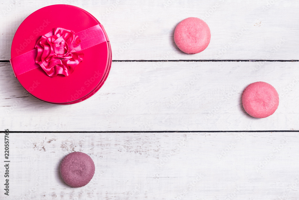 Group of macarons made of strawberries, cream, chocolate and blueberries. Rustic photo. Group of macarons made of strawberries, cream, chocolate and blueberries. Rustic photo.