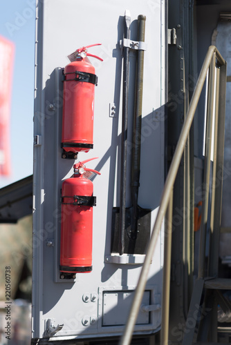 Fire extinguisher on a truck door