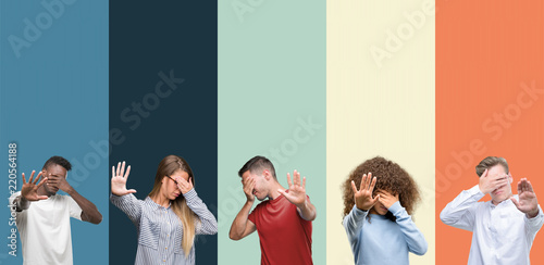 Group of people over vintage colors background covering eyes with hands and doing stop gesture with sad and fear expression. Embarrassed and negative concept.