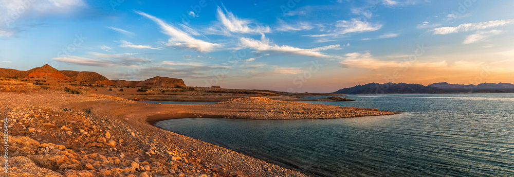 Beautiful panoramic landscape of the Lake Mead National Recreation Area from its muddy shore at sunset in summer, Nevada. - obrazy, fototapety, plakaty 