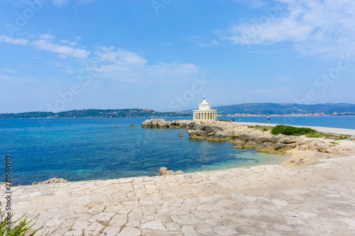 Lighthouse of saint Theodore in Argostoli Kefalonia, Greece. One of the main attractions and landmarks located on the coastal road from Argostoli to Lassi.  photo