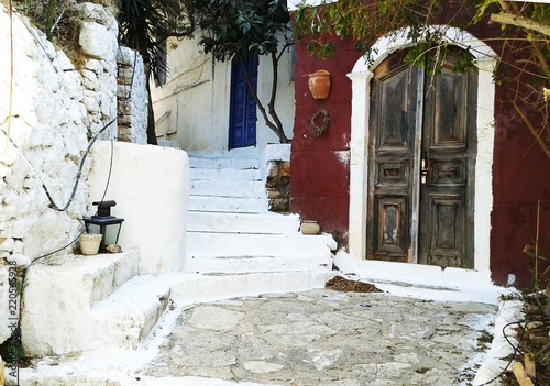 Ancient wooden door on Greece island photo