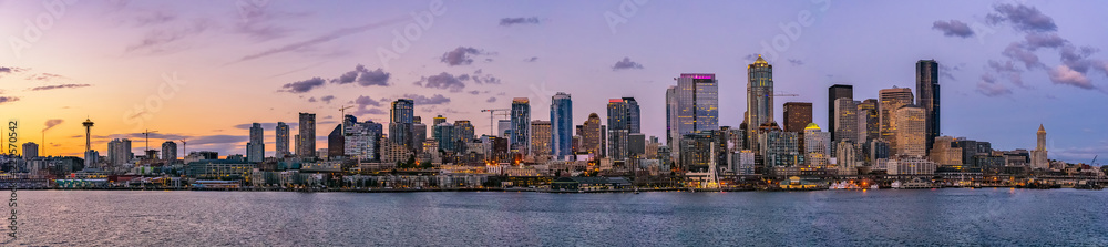 Beautiful Seattle skyline or cityscape from Elliot Bay, Puget Sound, at dusk or sunrise, Washington state, USA.