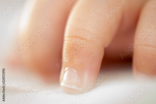 close up macro baby small tily finger care tender concept medicine