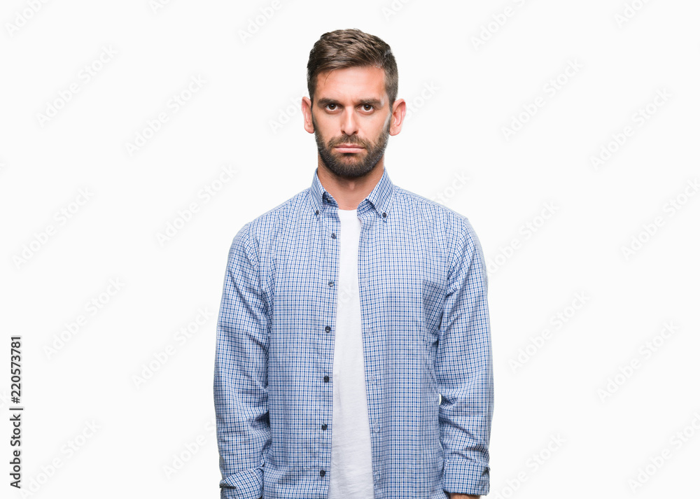 Young handsome man wearing white t-shirt over isolated background depressed and worry for distress, crying angry and afraid. Sad expression. Young handsome man wearing white t-shirt over isolated background depressed and worry for distress, crying angry and afraid. Sad expression.