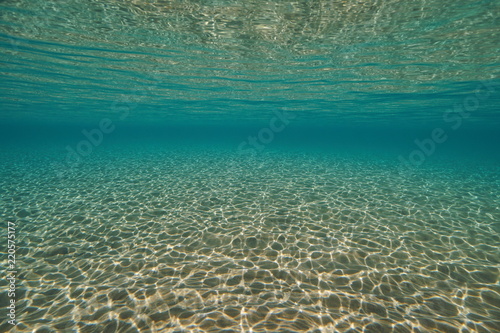 Underwater sand below water surface in the Mediterranean sea, natural scene, Spain