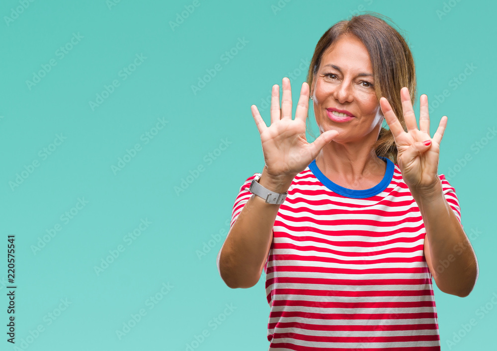 Middle age senior hispanic woman over isolated background showing and pointing up with fingers number nine while smiling confident and happy. Middle age senior hispanic woman over isolated background showing and pointing up with fingers number nine while smiling confident and happy.