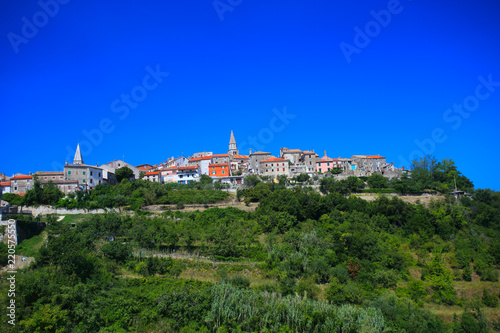 buje, idyllic old town on a hill in istria, croatia © ottoflick