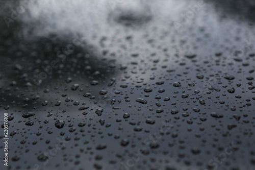 drops rain hood black car reflection sky