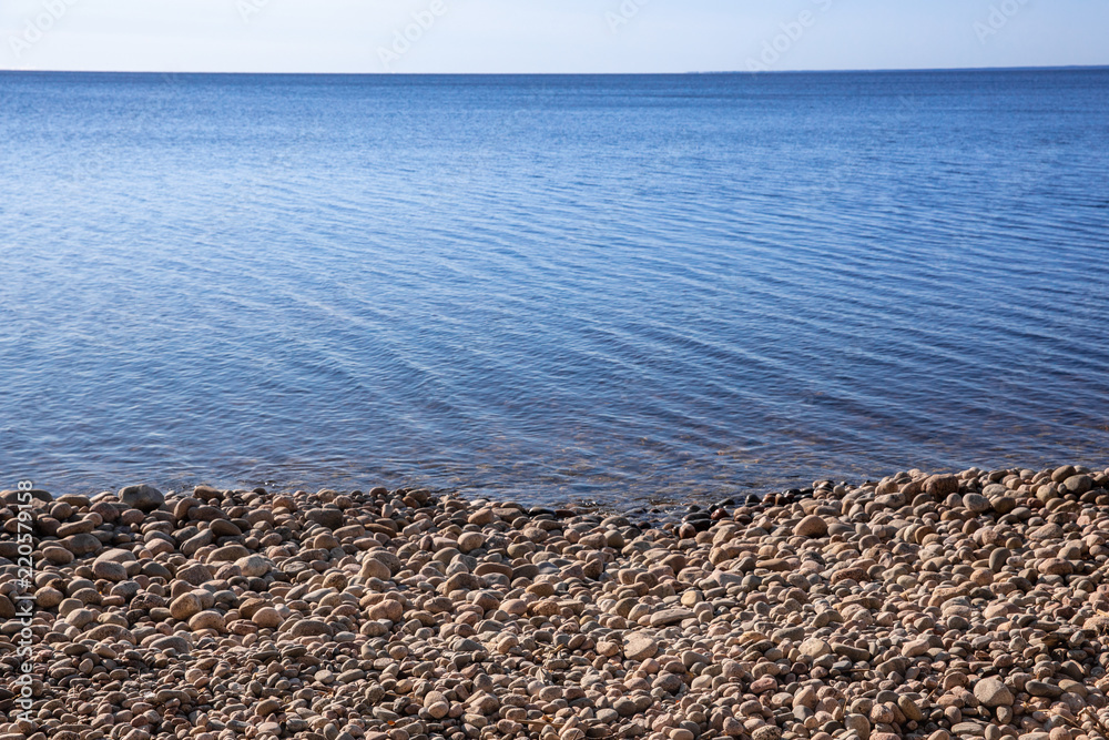 stones, blue water and sky. calmness and silence. skyline stones, blue water and sky. calmness and silence. skyline