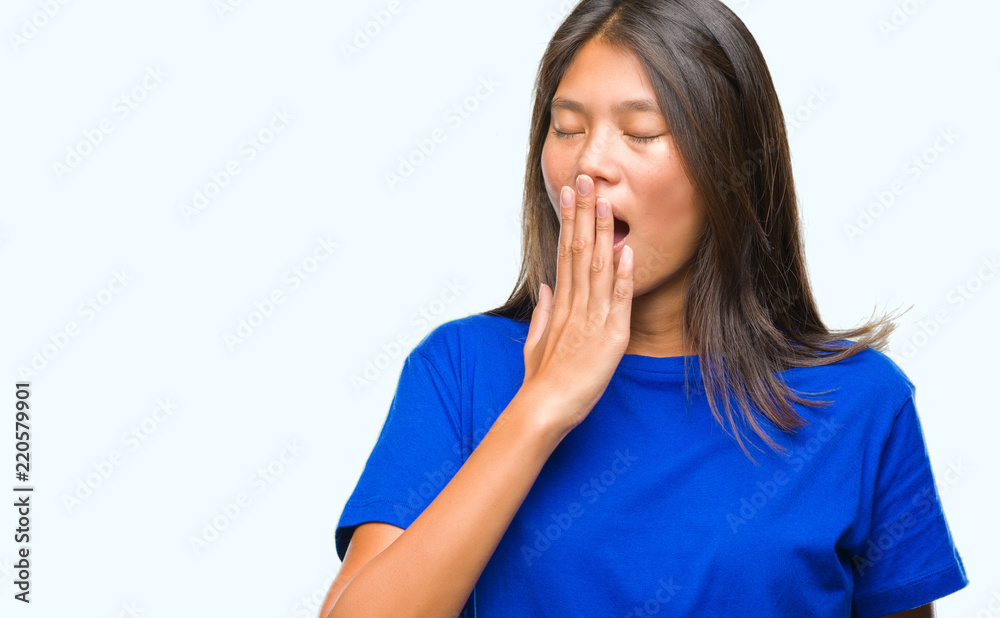 Young asian woman over isolated background bored yawning tired covering mouth with hand. Restless and sleepiness. Young asian woman over isolated background bored yawning tired covering mouth with hand. Restless and sleepiness.