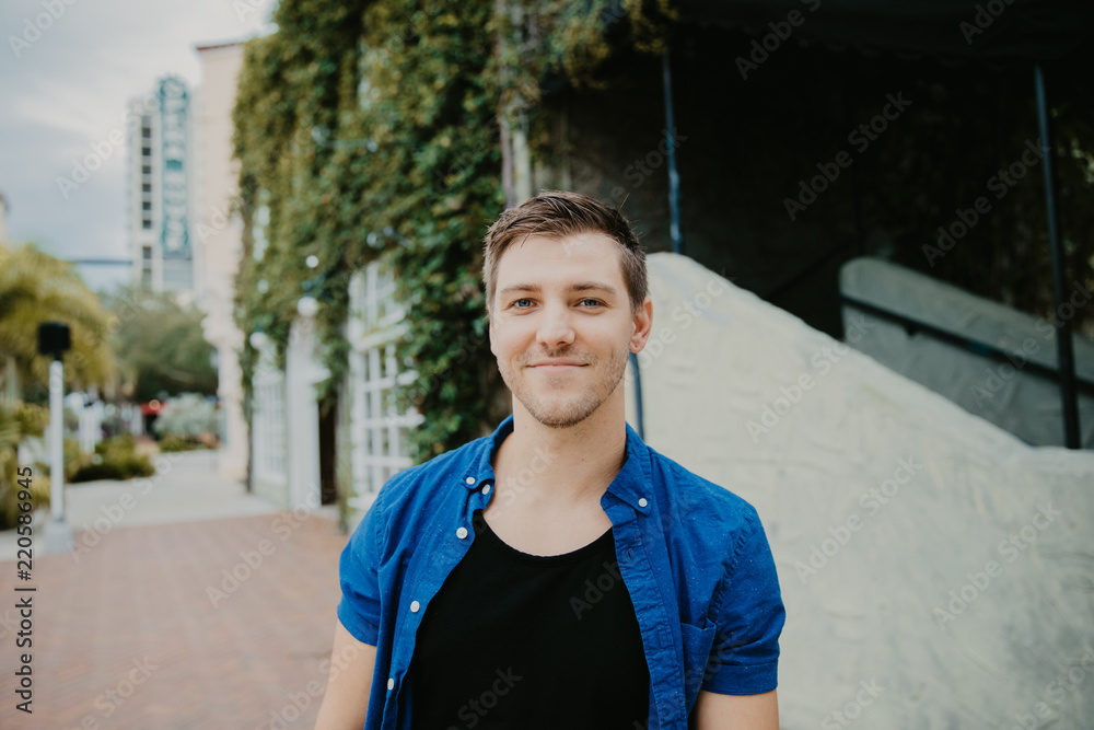 Attractive Young Man Model Smiling and Posing Down Town