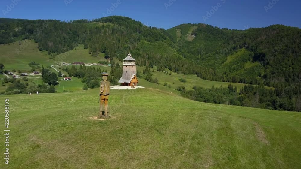 ZB05 ProRes CC Beautiful scenery at Zbojská in middle Slovakia near Pohronská Polhora and Tisovec. Slowly flying by a wooden thief - bandit and flying towards an observation tower on the top of hill ZB05 ProRes CC Beautiful scenery at Zbojská in middle Slovakia near Pohronská Polhora and Tisovec. Slowly flying by a wooden thief - bandit and flying towards an observation tower on the top of hill