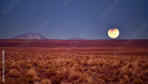 Partial Lunar eclipse over the Andean altiplano, Sud Lipez province, Eduardo Avaroa National Reserve, Bolivia