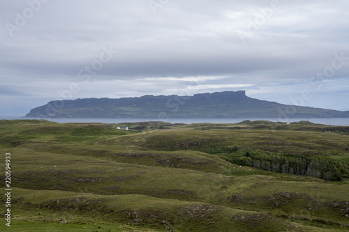 The Isle of Eigg as seen from the island of Muck.  Eigg is one of the Small Isles, in the Scottish Inner Hebrides.