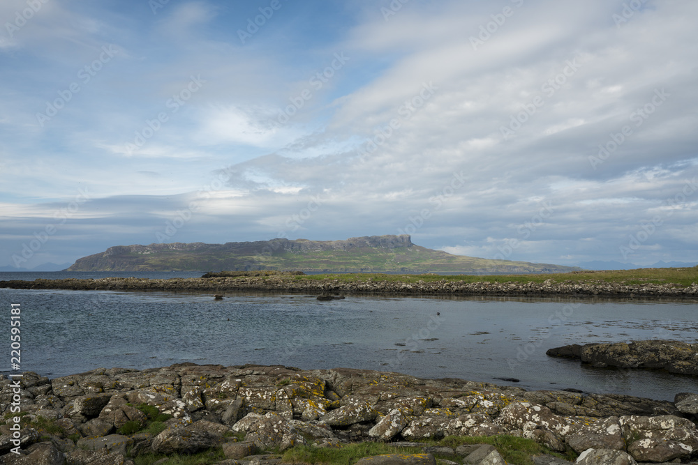 The Isle of Eigg as seen from the island of Muck.  Eigg is one of the Small Isles, in the Scottish Inner Hebrides.