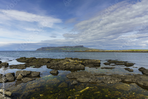 The Isle of Eigg as seen from the island of Muck. Eigg is one of the Small Isles, in the Scottish Inner Hebrides.