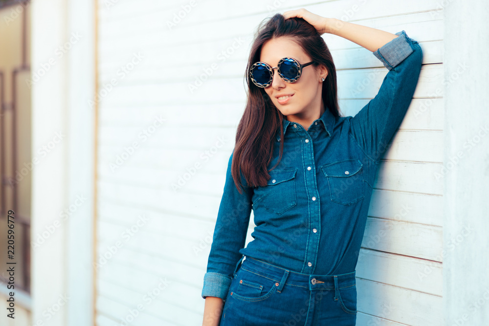 Stylish Autumn Girl in Denim Outfit Wearing Blue Matching Sunglasses Stylish Autumn Girl in Denim Outfit Wearing Blue Matching Sunglasses