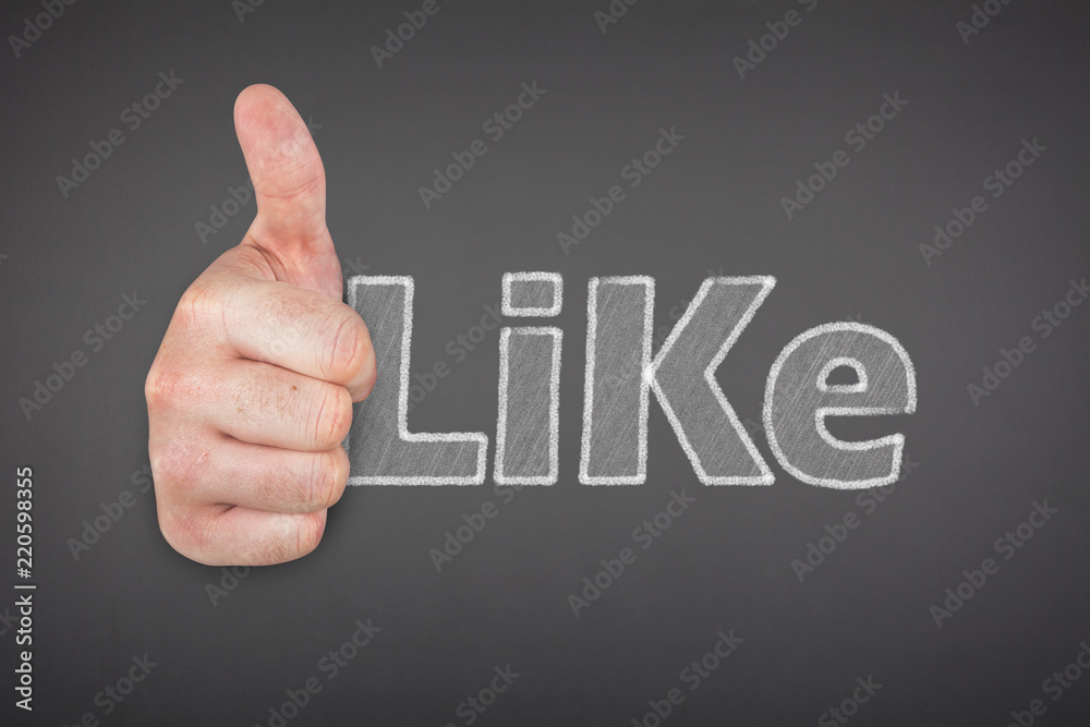 Like text on blackboard with businessman hand Like text on blackboard with businessman hand