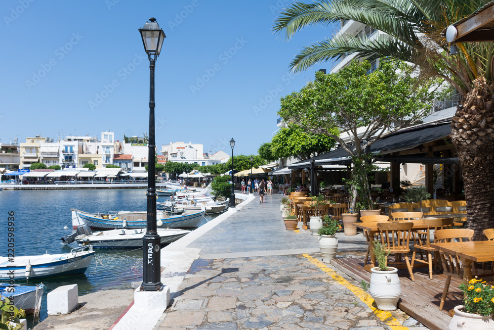 Agios Nikolaos. Crete. Greece. Cafe on the waterfront of Lake Voulismeni