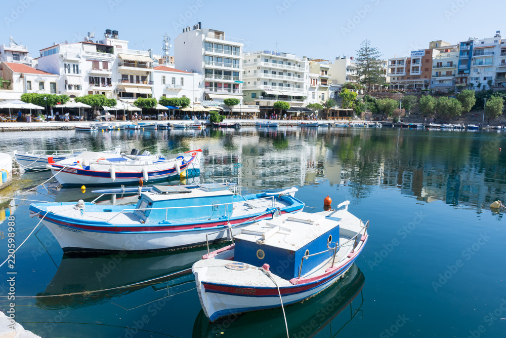 Agios Nikolaos. Crete. Boats at the pier on lake