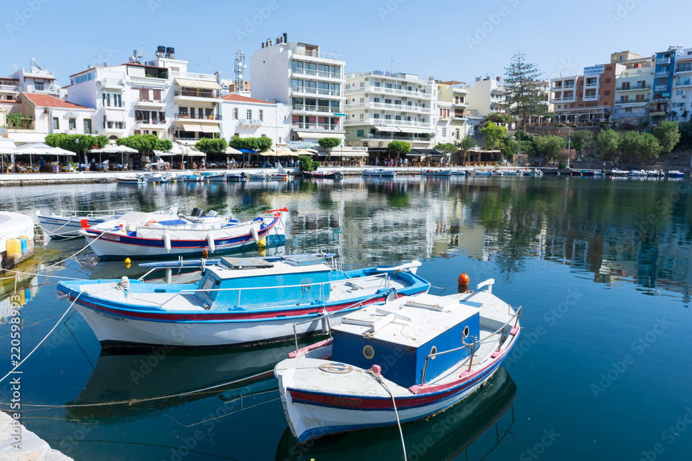 Agios Nikolaos. Crete. Boats at the pier on lake