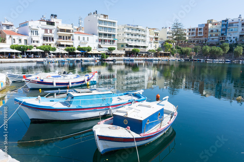 Agios Nikolaos. Crete. Boats at the pier on lake