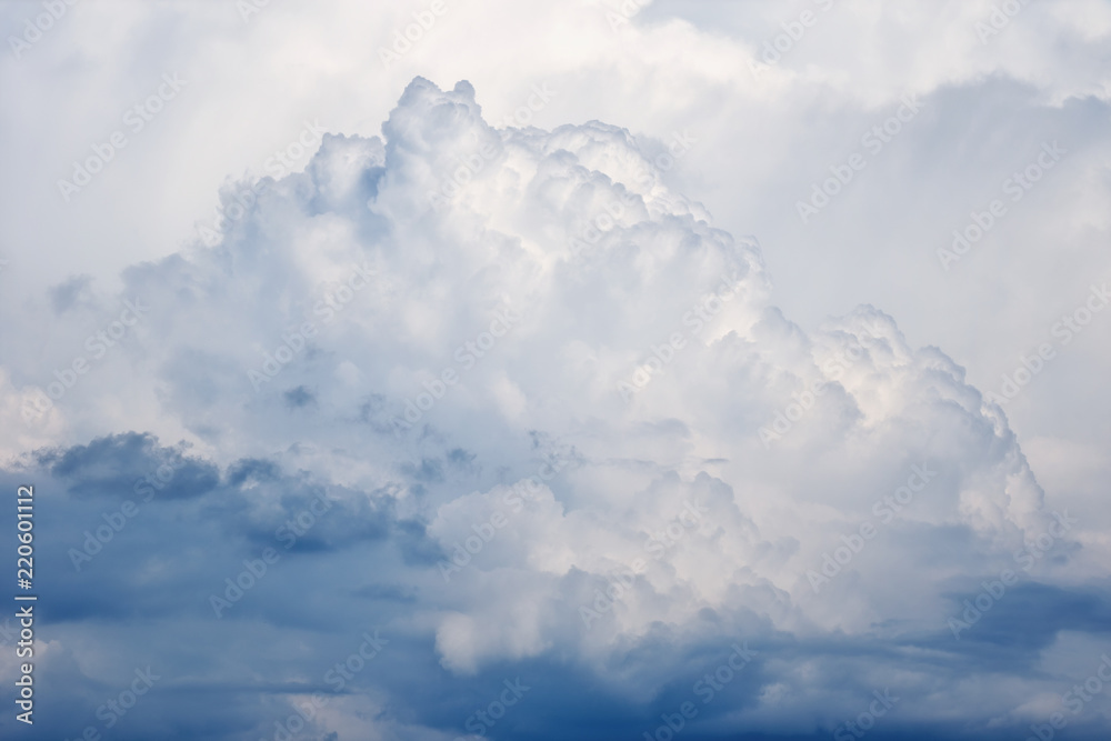 Huge white fluffy clouds on sky Huge white fluffy clouds on sky