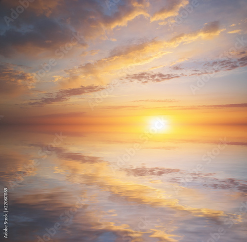Sky background and water reflection on sunset.