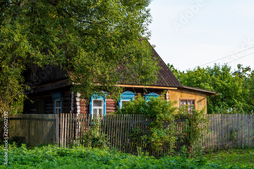 Old village houses in the village of Anisimovo. Kaluzhskiy region, Maloyaroslavetskiy district, Russia - September 2018 photo