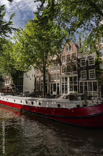 canal view with traditional buildings in Amsterdam, Netherlands