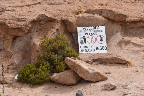 A sign giving instructions to tourists at the Mirador Volcan Ollague, near Uyuni, Bolivia photo