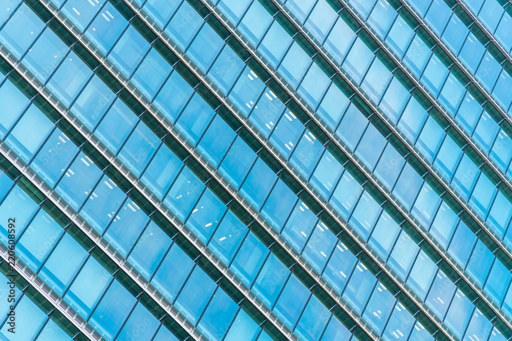 Beautiful architecture office building skyscraper with window glass pattern