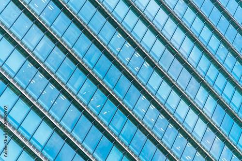 Beautiful architecture office building skyscraper with window glass pattern