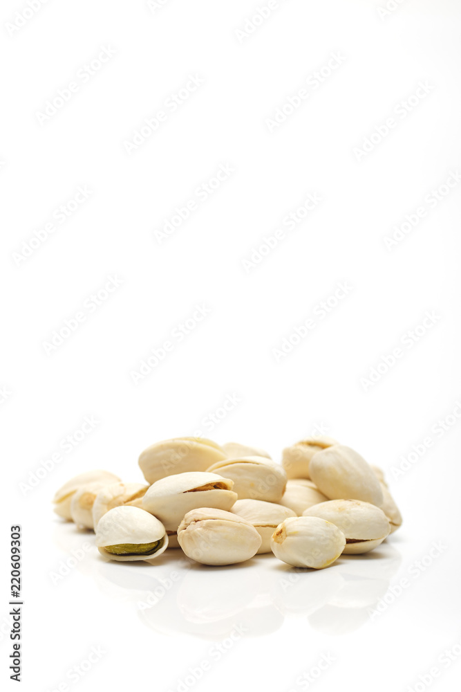 Heap of salted pistachio nuts