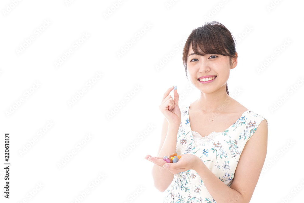 Young woman eating sweets