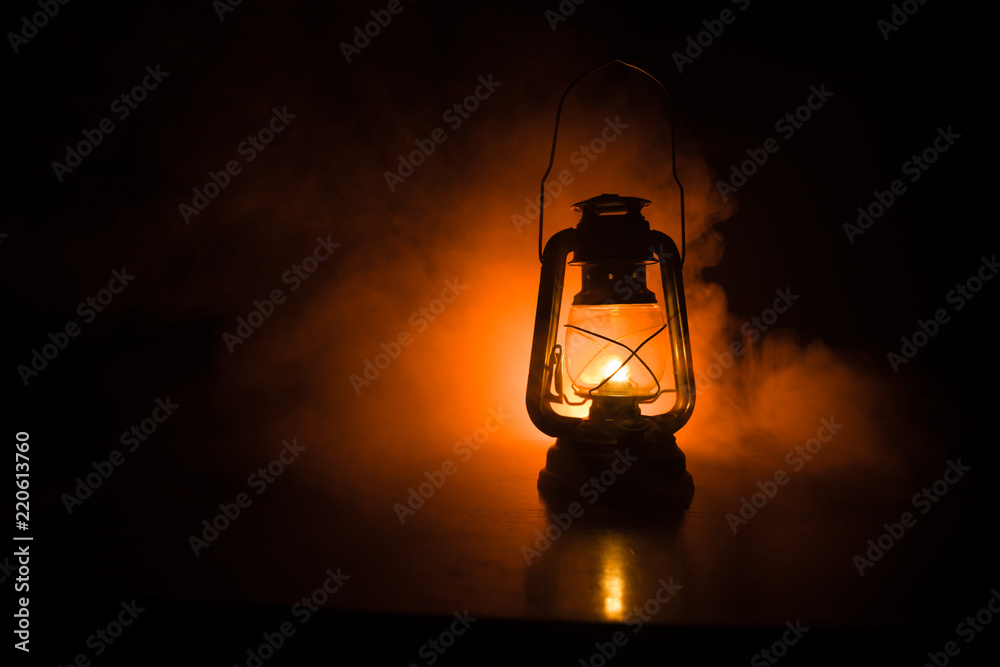 Oil Lamp Lighting up the Darkness or Burning kerosene lamp background,  concept lighting. Selective focus Stock Photo | Adobe Stock