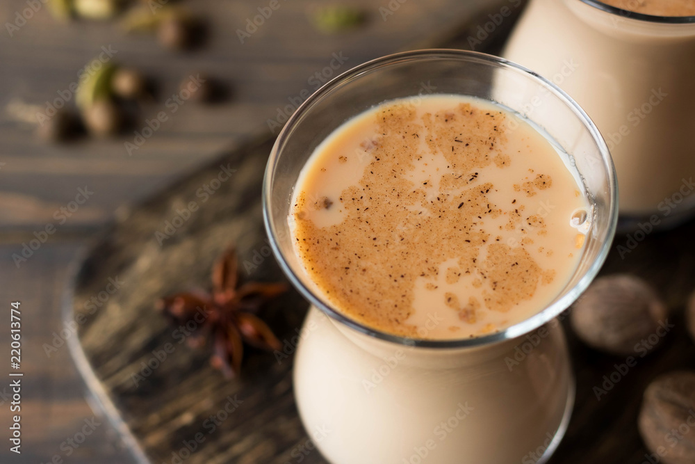 Traditional Indian masala tea. Spicy tea with aromatic spices and milk. Traditional Indian masala tea. Spicy tea with aromatic spices and milk.