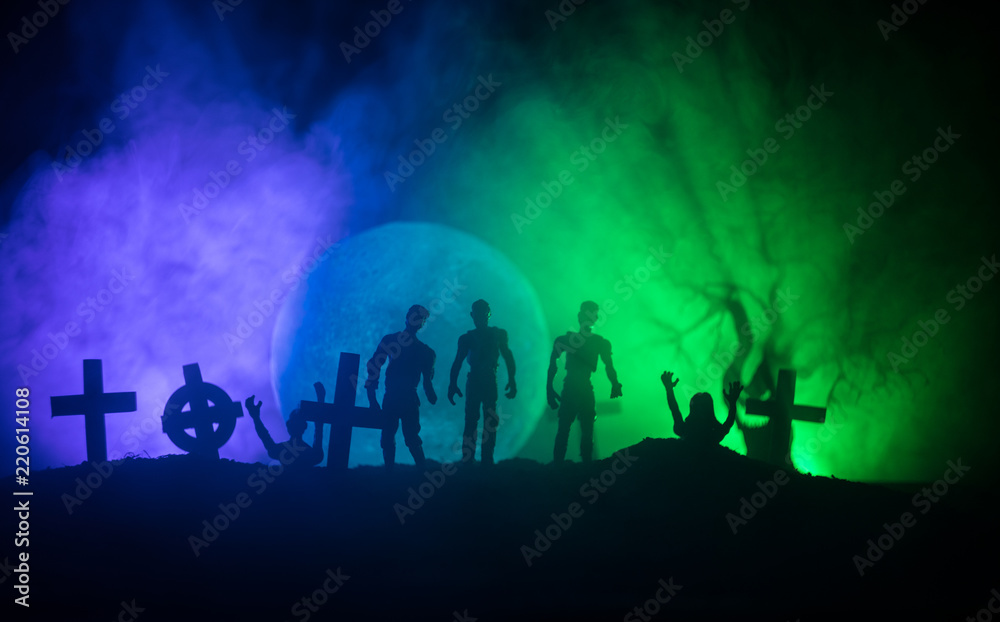 Scary view of zombies at cemetery dead tree, moon, church and spooky cloudy sky with fog, Horror Halloween concept. Scary view of zombies at cemetery dead tree, moon, church and spooky cloudy sky with fog, Horror Halloween concept.