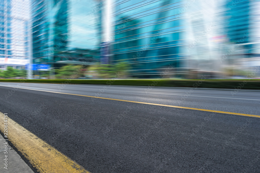 empty urban road with modern building in the city. empty urban road with modern building in the city.