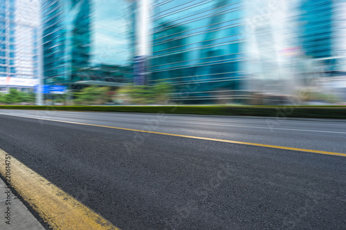 empty urban road with modern building in the city.