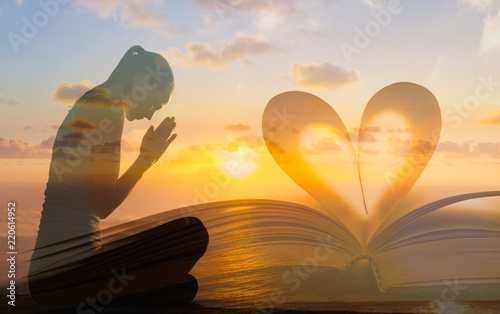 Photography Woman praying. Praying and religion concept.Double exposure.