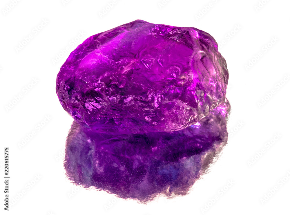 Amethyst stone with reflection on white background
