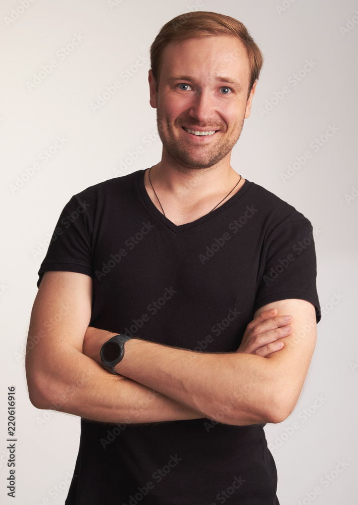 Handsome man is toothy smiling. Isolated