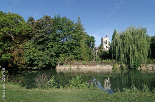 church on Grand Morin river bank in Crecy la Chapelle village photo