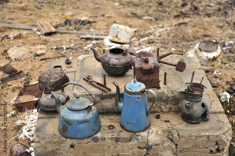 A collection of old kettles that were used during polar expeditions in Greenland. A collection of old kettles that were used during polar expeditions in Greenland.