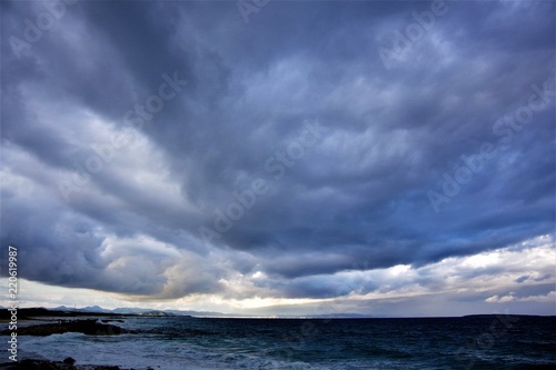 gray storm clouds over the sea