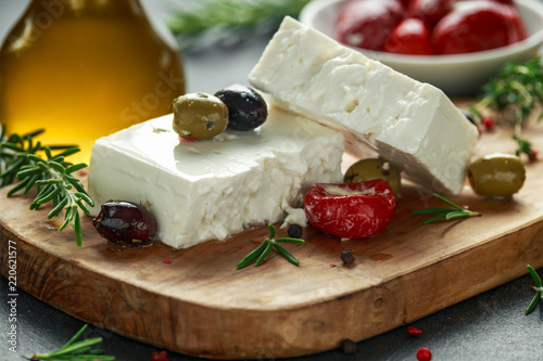 Greek cheese feta with thyme, rosemary, olives and stuffed red bell peppers