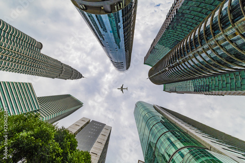 Photography KUALA LUMPUR, 2 August 2018 - Up view of Kuala Lumpur skyline on the tall skyscr